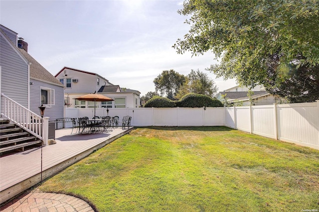 view of yard featuring a deck