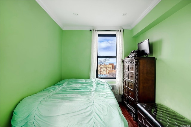 bedroom with crown molding