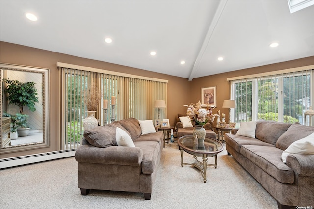 carpeted living room with lofted ceiling with skylight and a baseboard heating unit