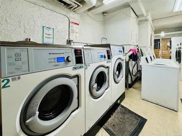 washroom with washer and clothes dryer