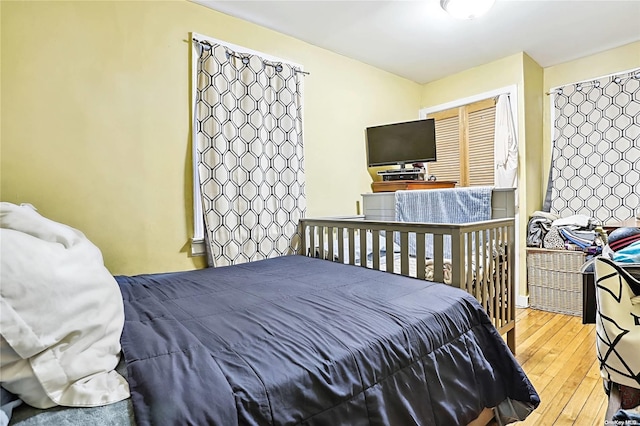 bedroom featuring hardwood / wood-style floors