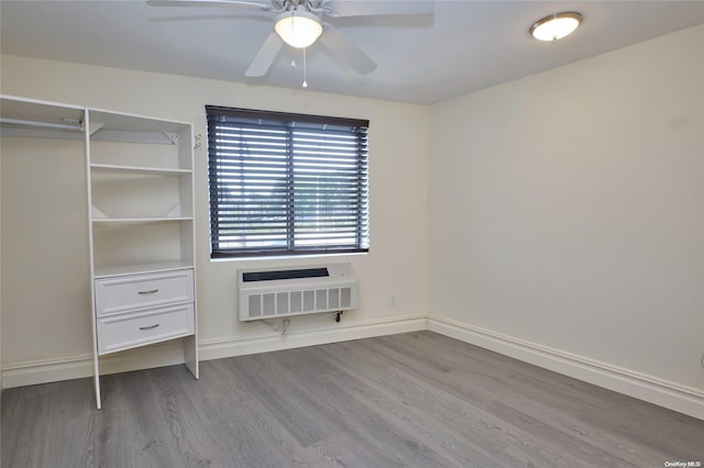 interior space with heating unit, ceiling fan, a closet, and light hardwood / wood-style floors