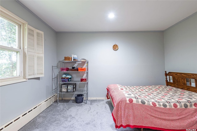 bedroom with carpet, a baseboard radiator, and ornamental molding