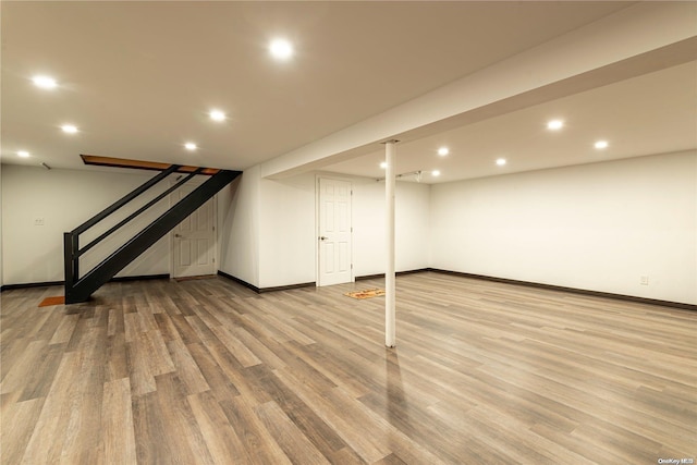 basement featuring light wood-type flooring