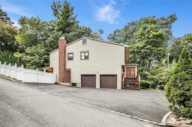 view of home's exterior featuring a garage