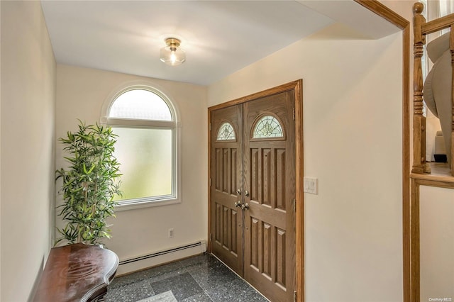 foyer featuring baseboard heating