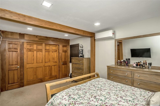 bedroom with an AC wall unit, carpet floors, and beam ceiling