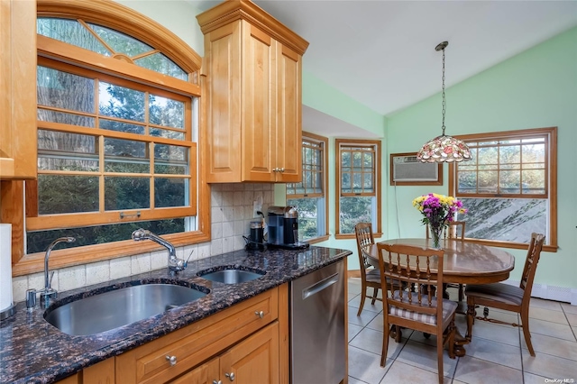 kitchen with decorative backsplash, an AC wall unit, dark stone countertops, dishwasher, and lofted ceiling