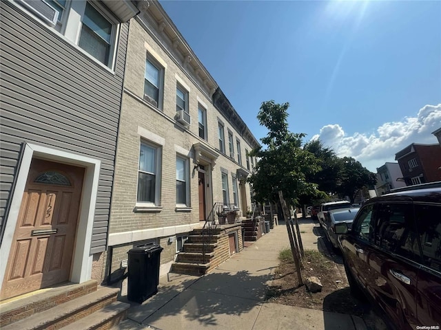 view of side of home with cooling unit