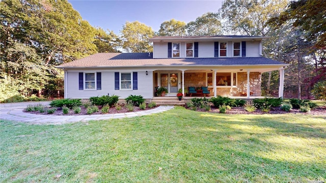 view of front of house with a front lawn and a porch