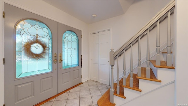 tiled foyer with french doors