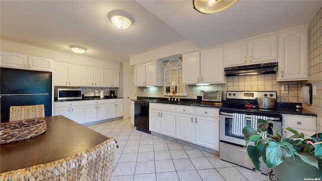 kitchen featuring decorative backsplash, sink, white cabinets, and black appliances