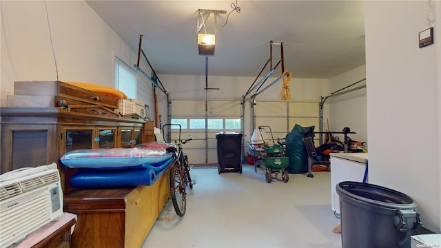 garage with white refrigerator and a garage door opener