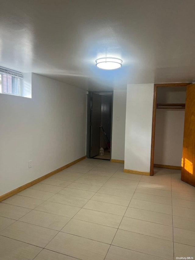 interior space with light tile patterned floors