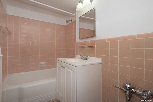 35-51 85th St Unit 3-L, Jackson Heights, NY 11372 - bathroom with vanity, tile walls, and tiled shower / bath