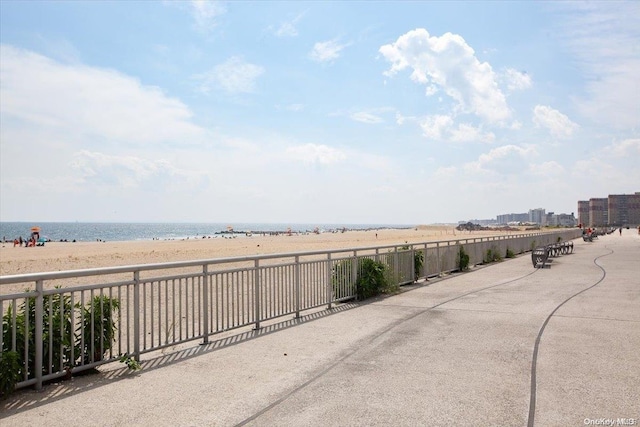 view of water feature with a beach view