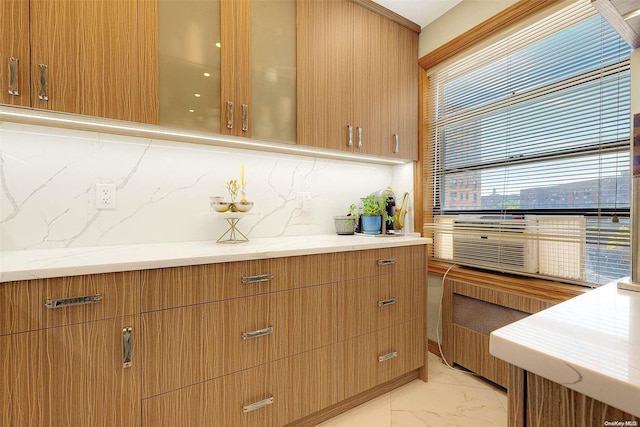 kitchen featuring tasteful backsplash and cooling unit