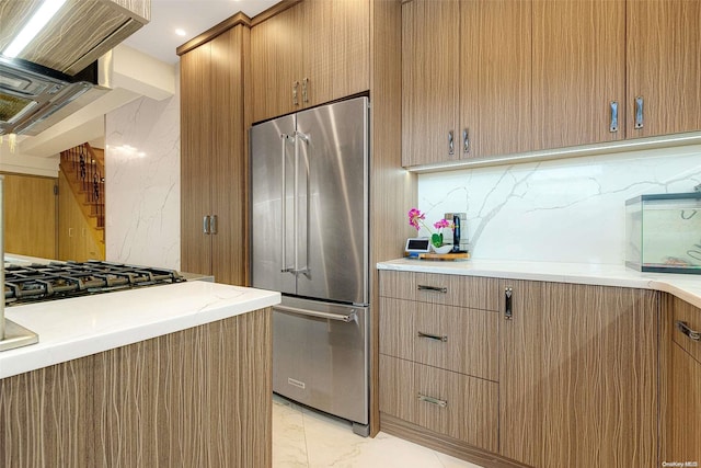 kitchen featuring decorative backsplash and stainless steel appliances