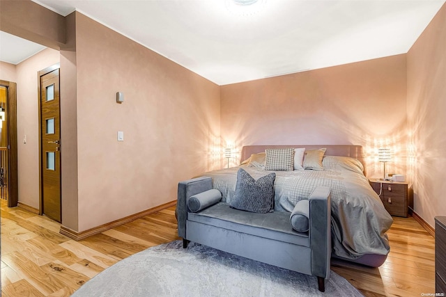 bedroom with light wood-type flooring