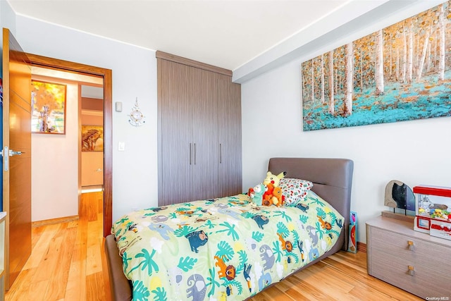 bedroom featuring light hardwood / wood-style floors