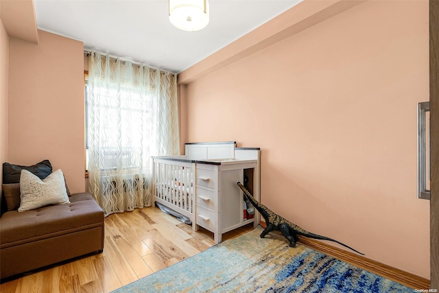 bedroom featuring hardwood / wood-style flooring