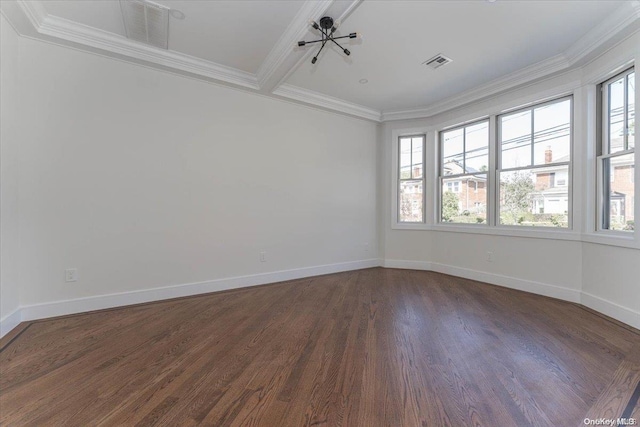 spare room with a notable chandelier, dark hardwood / wood-style flooring, and crown molding