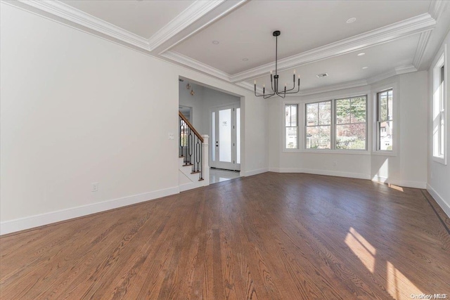 interior space with a notable chandelier, crown molding, and dark wood-type flooring