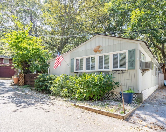 view of front of property featuring cooling unit