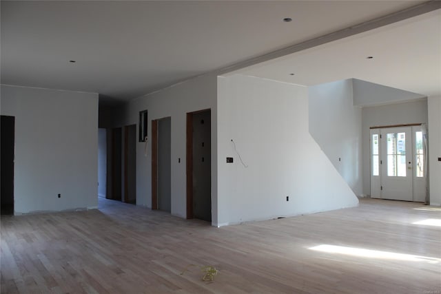 spare room with light wood-type flooring