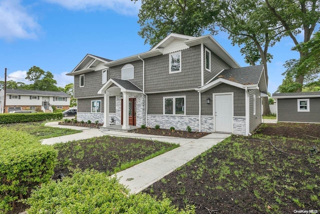 view of front of home with a front lawn