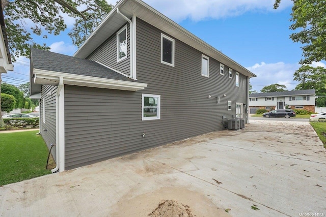 view of property exterior with central AC unit