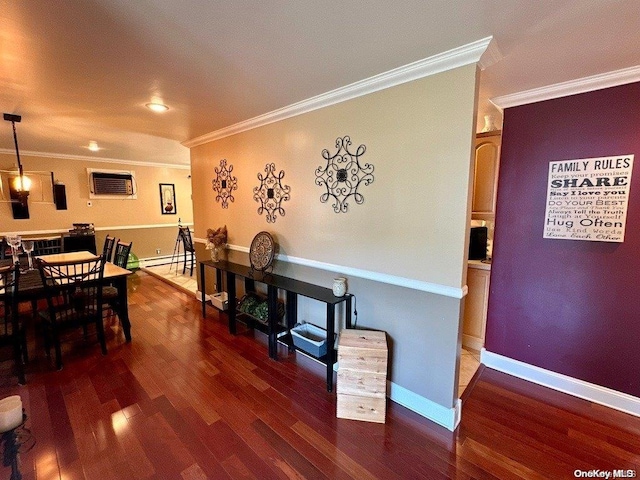 dining area with crown molding and dark wood-type flooring