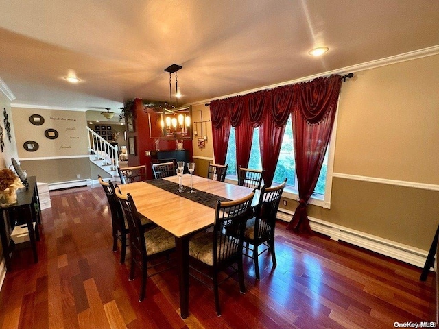 dining space featuring dark hardwood / wood-style floors, a baseboard radiator, and crown molding