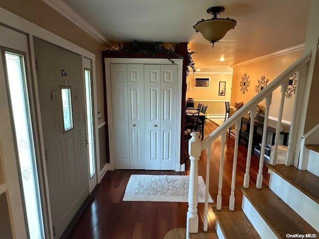 entrance foyer featuring dark hardwood / wood-style floors and ornamental molding