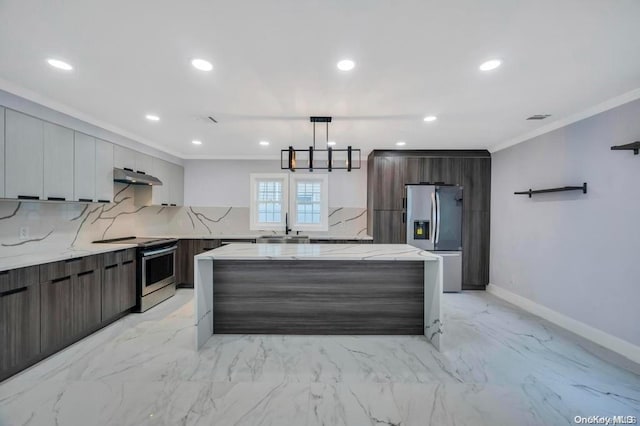 kitchen with a spacious island, light stone countertops, tasteful backsplash, decorative light fixtures, and stainless steel appliances