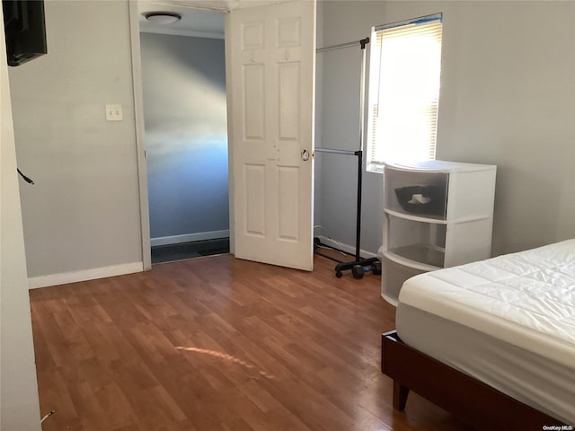 bedroom featuring hardwood / wood-style floors