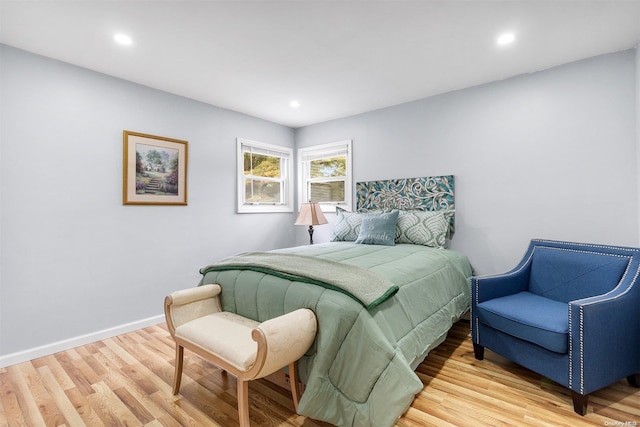 bedroom with light hardwood / wood-style flooring