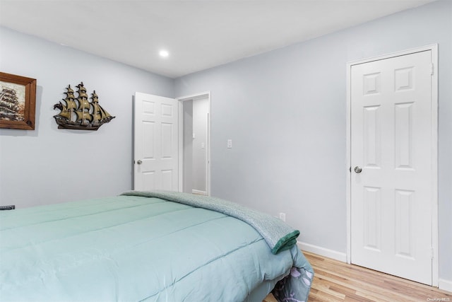 bedroom featuring hardwood / wood-style flooring