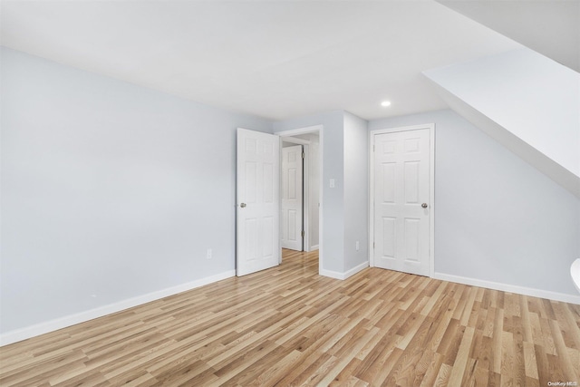 bonus room featuring light hardwood / wood-style floors