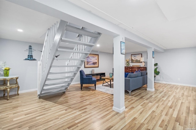 living area with light hardwood / wood-style flooring