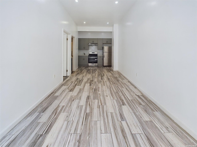 unfurnished living room featuring light hardwood / wood-style floors