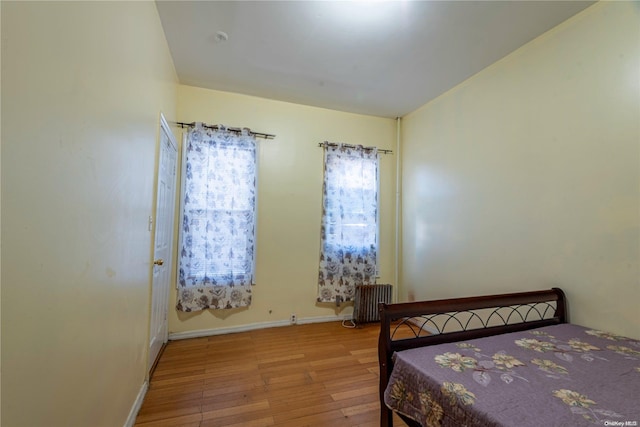 bedroom with light wood-type flooring