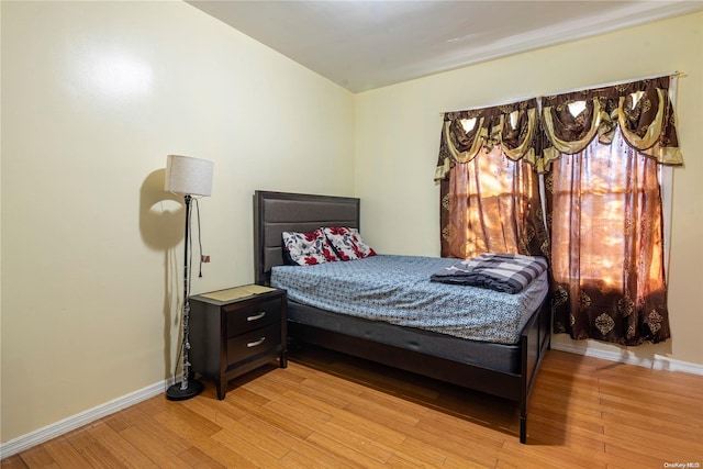 bedroom with light wood-type flooring