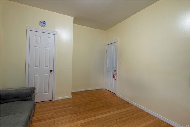 hall with light wood-type flooring