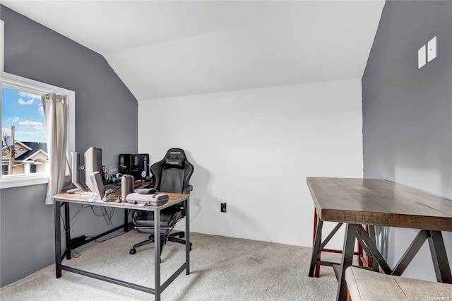 home office with light colored carpet and lofted ceiling