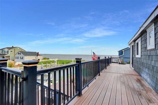 deck featuring a water view