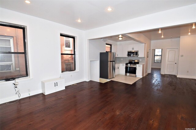 unfurnished living room with light hardwood / wood-style flooring