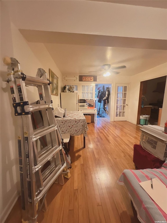 interior space featuring hardwood / wood-style flooring and ceiling fan