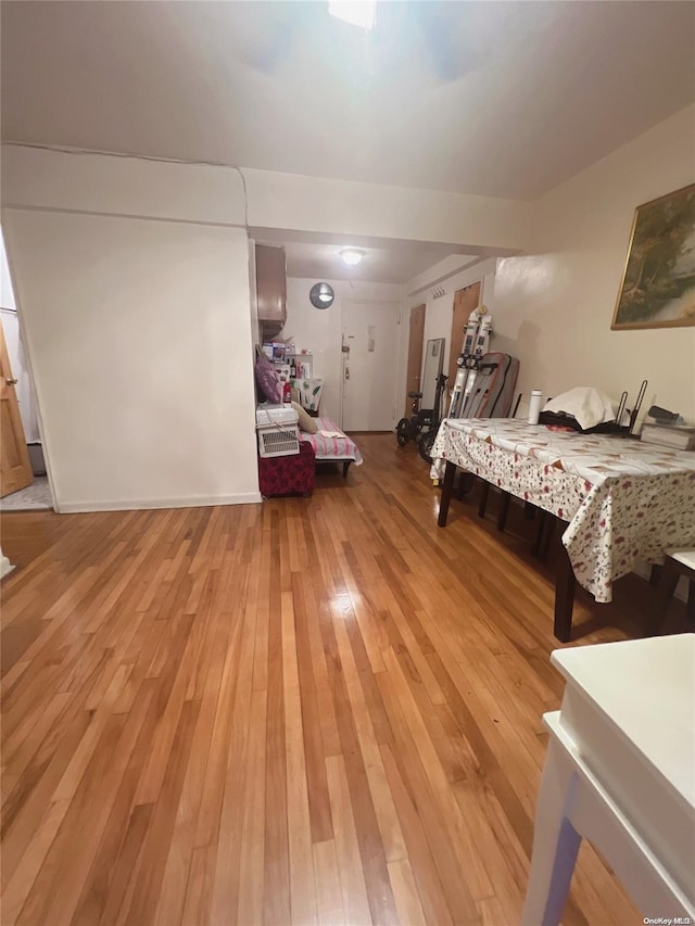 bedroom with wood-type flooring