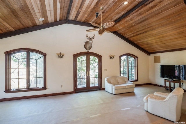 unfurnished living room with vaulted ceiling with beams, ceiling fan, wood ceiling, and french doors